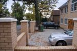 Double brick walls & pillars using matching brick to property with brick on edge to finish